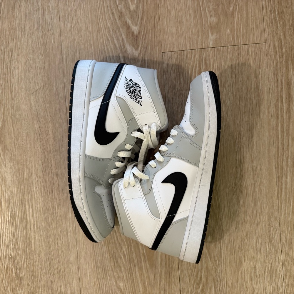 Nike Jordan’s White, Black, and Gray Sneakers